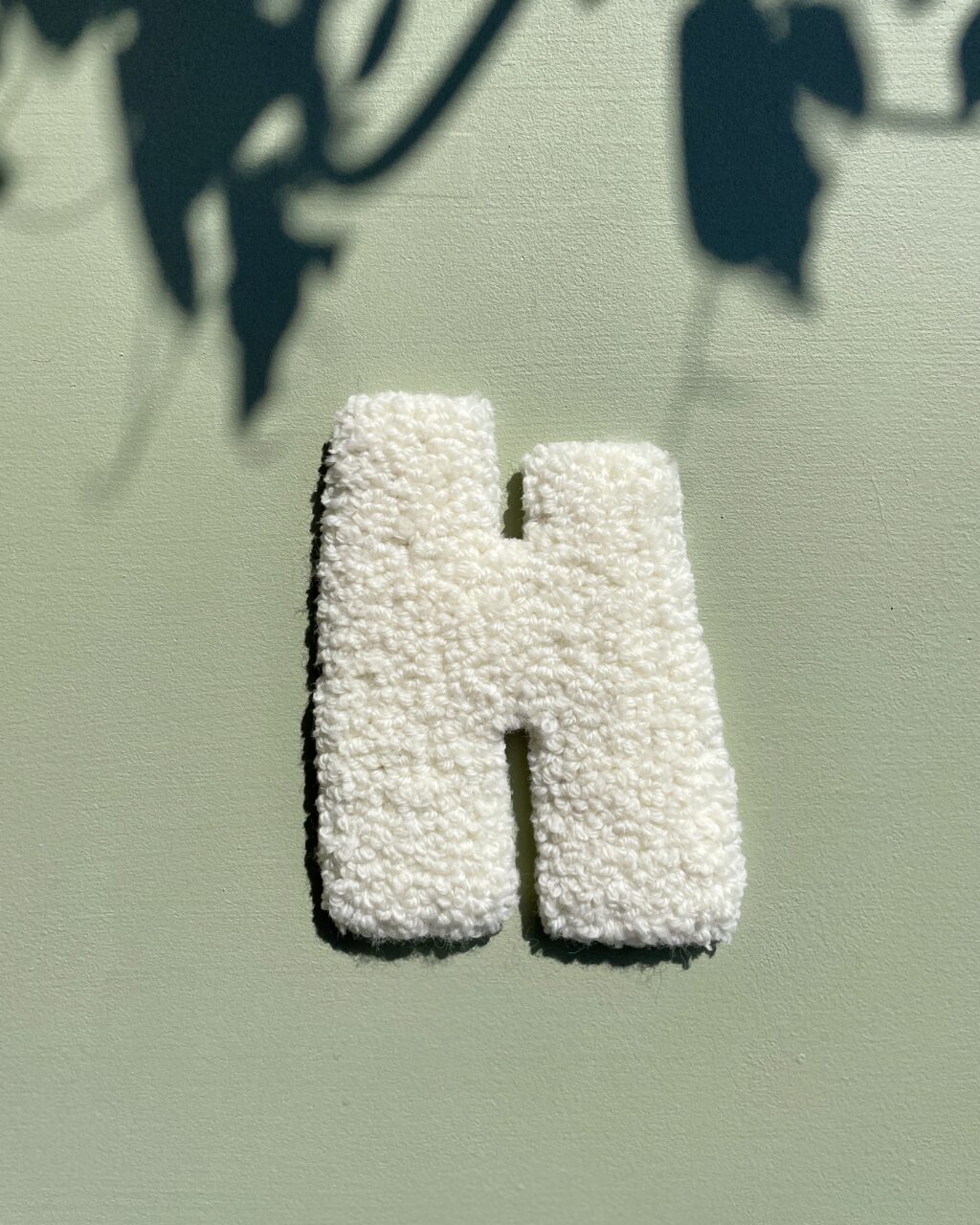H - Tuftede bogstaver