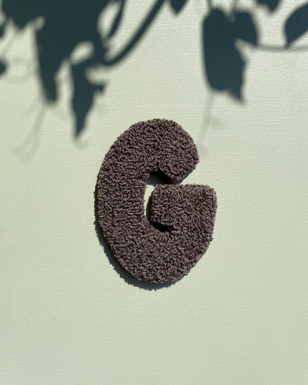 G - Tuftede bogstaver