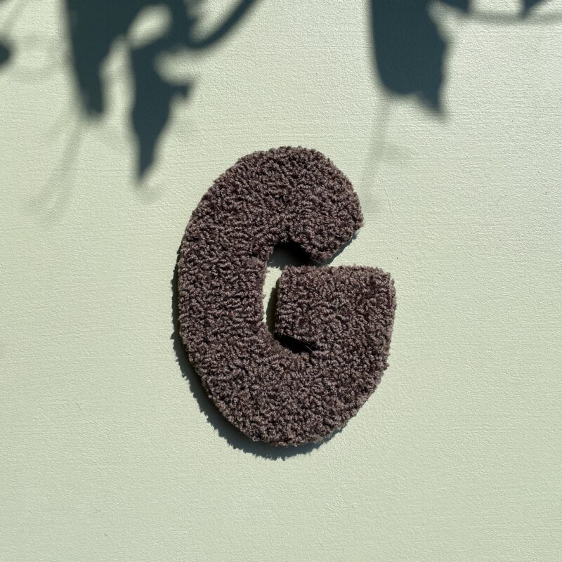 G - Tuftede bogstaver
